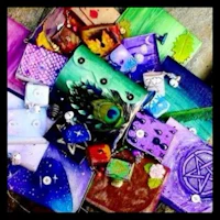 a pile of colorful and patterned notebooks on a table