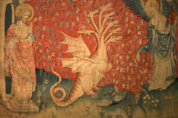 a tapestry depicting a dragon and angels